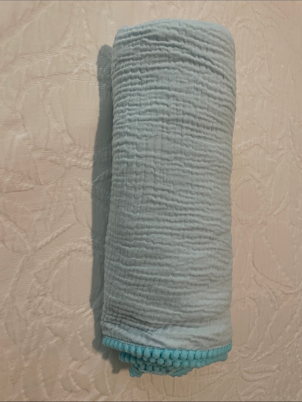 Light Blue Cotton Muslin baby blanket with Pom Trim